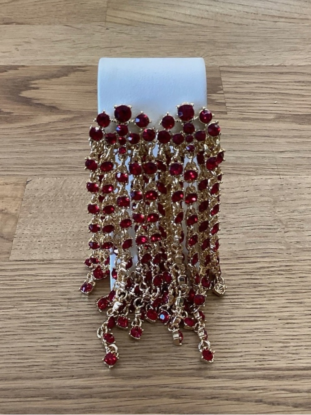 Like new Oscar de la Renta Gold-Tone Drape Earrings with Red Crystals